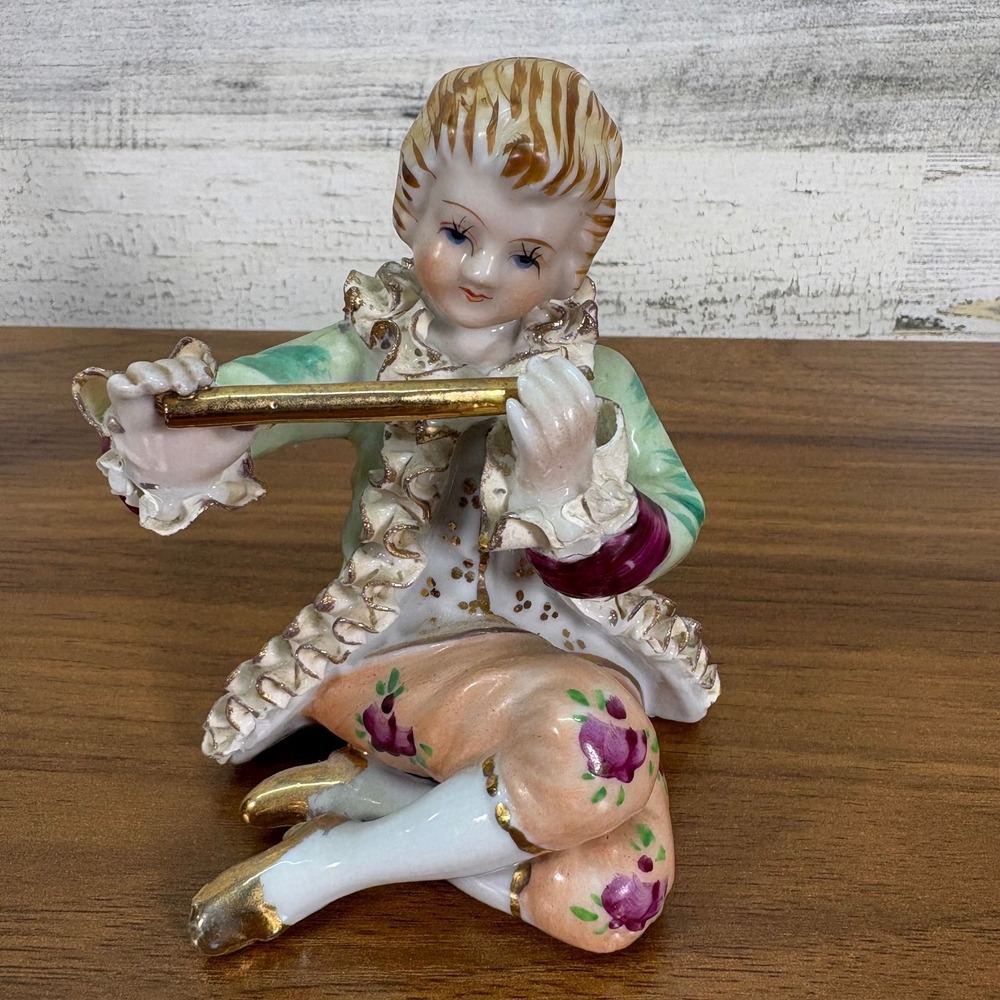 Betson's Japanese Porcelain Hand Painted Victorian Flute Playing Boy